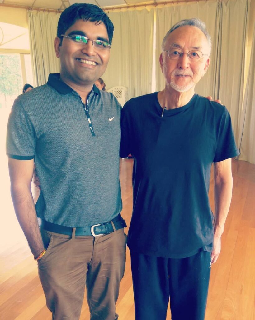 Mr. Imakuma, the renowned atomic scientist, engaged in a discussion on 'The Hidden Secrets of Atomic Science in Ayurveda